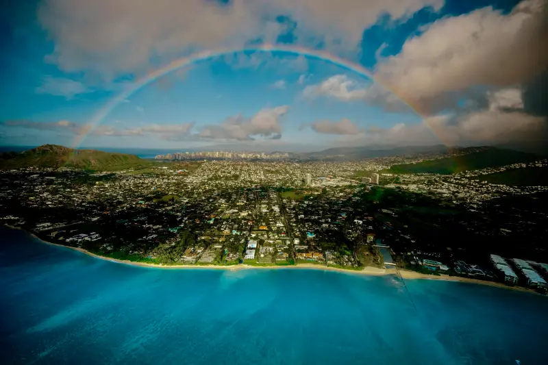 a rainbow over a body of water
